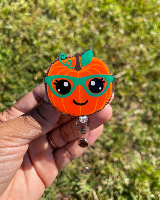 Pumpkin With Glasses Badge Reel